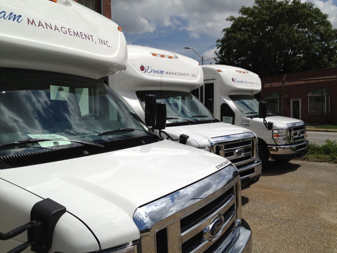 Row of DMI shuttle busses
