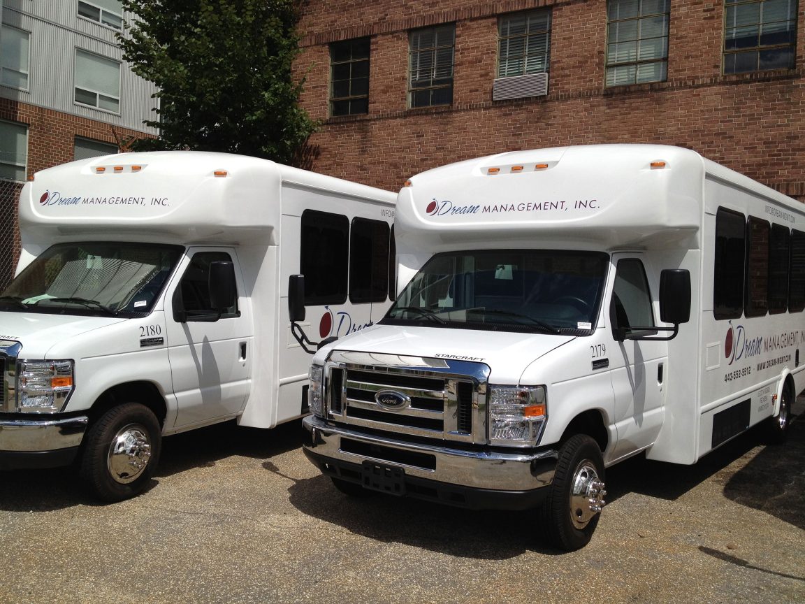 Two DMI shuttle buses